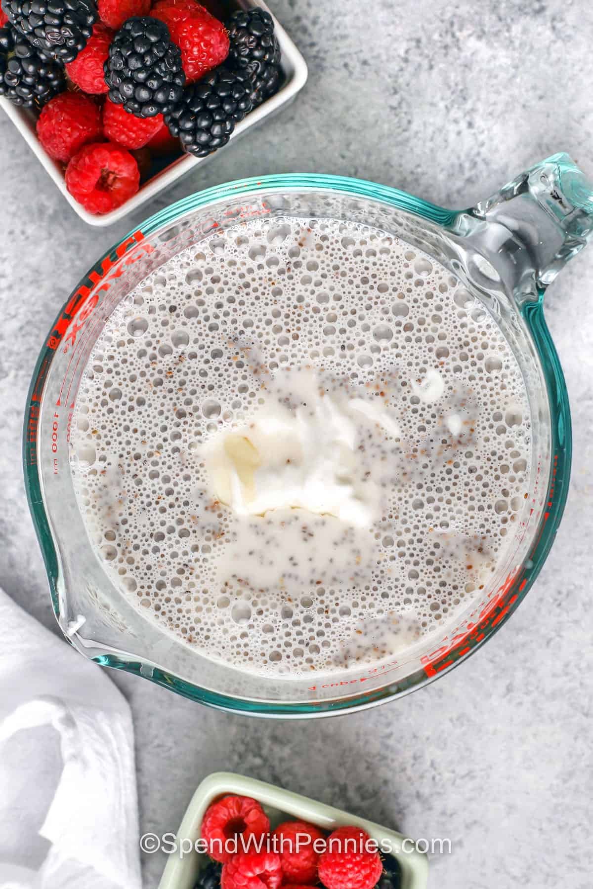 adding yogurt to ingredients to make Chia Seed Pudding