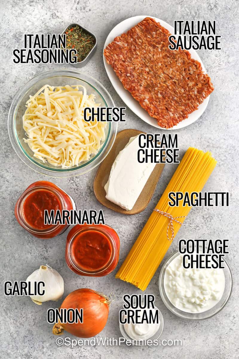 Million dollar spaghetti recipe layers tender spaghetti with rich meat sauce and an extra-creamy cheese filling before everything is baked until bubbly. Italian sausage adds lots of flavor without extra work, while prepared marinara makes this crowd-sized casserole practical for home cooks. The casserole can be assembled in advance and baked when dinner gets close. Pin this cheesy baked spaghetti recipe for an easy comfort-food dinner. #spendwithpennies italian seasoning , italian sausage , cheese , cream cheese , marinara , spaghetti , cottage cheese ,sour cream , onion , garlic with labels to make Million Dollar Spaghetti