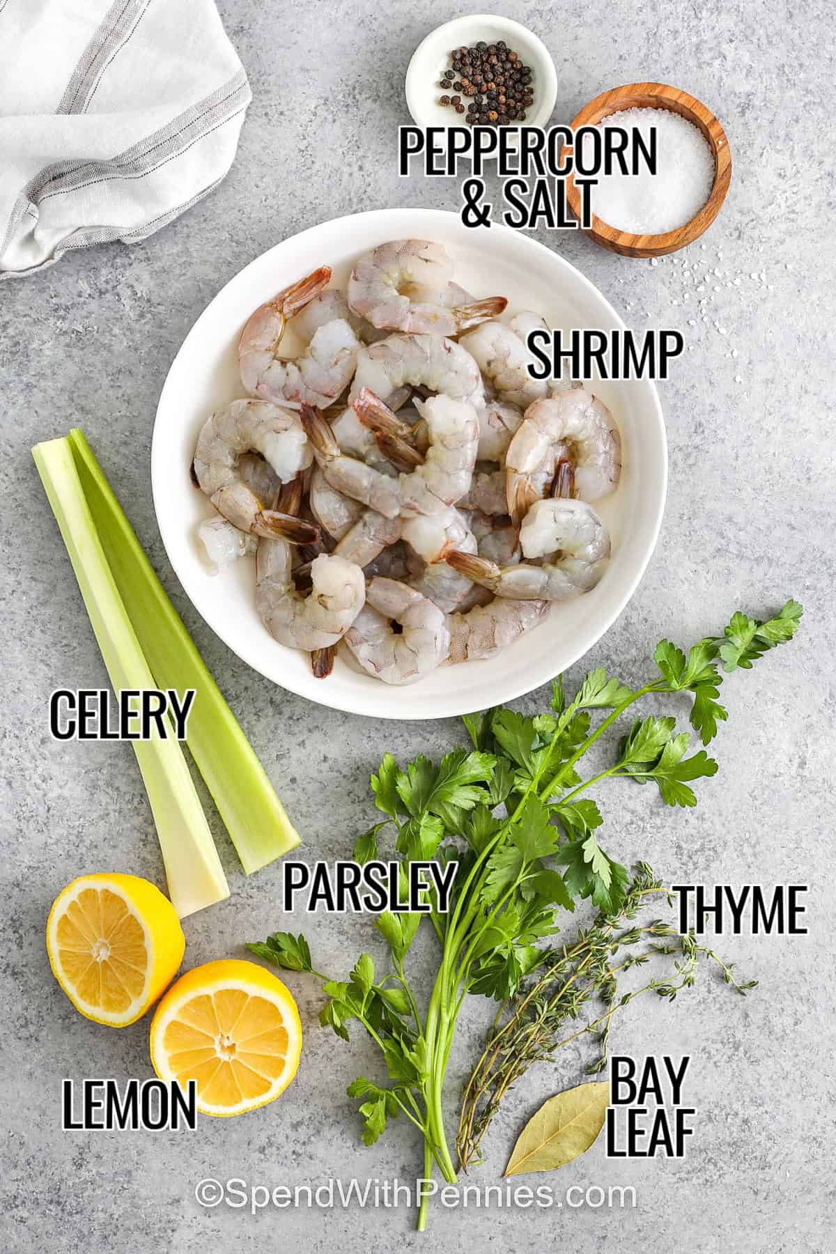 shrimp , celery , lemon , parsley , thyme , bay leaf , salt and peppercorn with labels to make Shrimp Cocktail