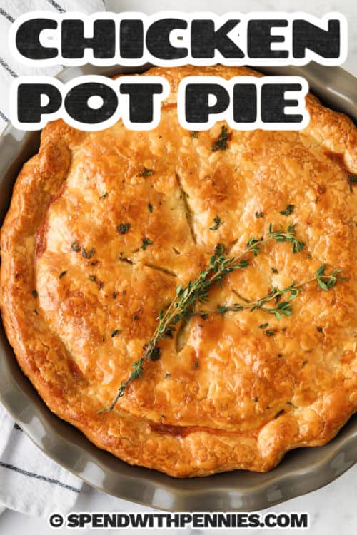 Homemade chicken pot pie brings old fashioned comfort to your table with a creamy filling and flaky crust. Hearty vegetables and tender chunks of chicken are baked together for the best cozy meal. Use rotisserie chicken or leftovers to make it easy, or create everything from scratch. Double the recipe, bake it in a casserole, and freeze one for a ready-made hearty dinner. #spendwithpennies Homemade Chicken Pot Pie with a title