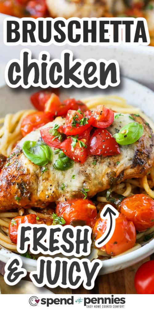 Bruschetta chicken is a baked casserole dish that’s loaded with Italian flavors. Tender chicken breast rests on marinara with cherry tomatoes, mozzarella, and a tangy balsamic drizzle. A fresh tomato and basil topping adds the perfect finish. This easy recipe is delicious over pasta, with garlic bread, or alongside a crisp green salad. #spendwithpennies serving of bruschetta chicken on a platter over pasta with writing