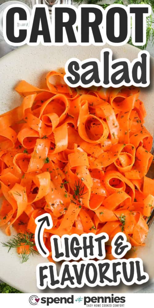 Carrot salad is a fresh and simple way to enjoy crisp veggies with a zesty twist. Grated or shredded carrots are mixed with a tangy lemon dressing sweetened with a hint of honey, then tossed with parsley and dill for an herby touch. This cold salad is light yet full of flavor, making it perfect for almost any meal. Easy to put together and so refreshing, it’s a dish you’ll want to make again and again. #spendwithpennies light and flavorful Herbed Carrot Salad with writing