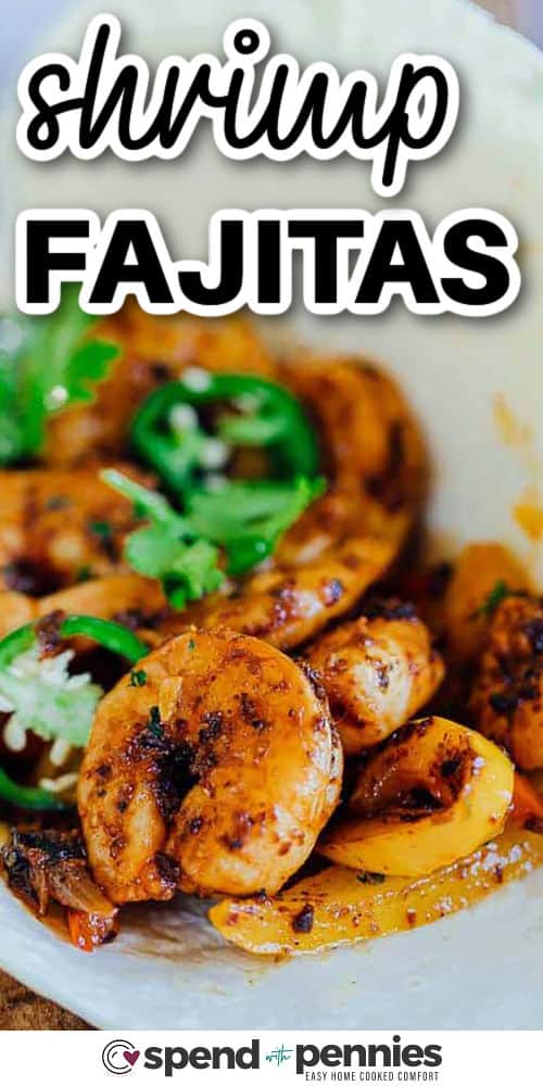 These shrimp fajitas are filled with smoky chili flavor, tender shrimp, and bright bell peppers. Cooked in a single pan, this easy recipe is perfect for quick cleanup. Serve the sizzling mixture with warm tortillas and fresh toppings like lime, guacamole, or salsa. It’s a simple way to make a meal that’s colorful, fresh, and so delicious, you’ll want to enjoy it again and again. #spendwithpennies Shrimp Fajitas with a title