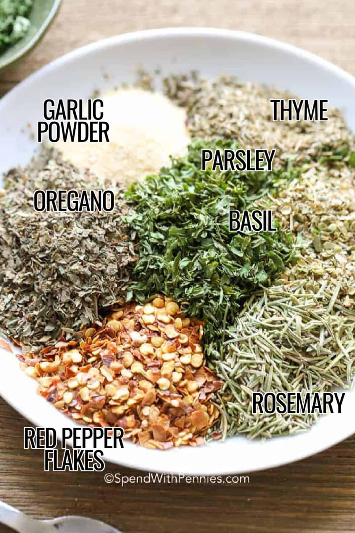 garlic powder , oregano , parsley , basil , thyme , red pepper flakes and rosemary with labels to make Italian Seasoning