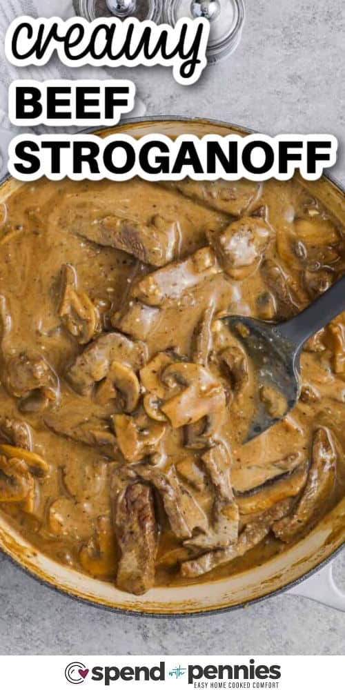 creamy Beef Stroganoff in a pot with a title