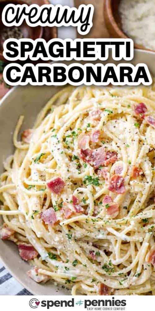 Spaghetti carbonara is a classic Roman pasta dish that’s simple, hearty, and full of flavor. Made with pantry staples and no cream, the sauce is silky from eggs and cheese and gets a savory kick from bacon. Perfect for a quick dinner, this dish is both impressive and easy. You’ll love how fast and delicious this comfort food comes together. #spendwithpennies creamy Spaghetti Carbonara in the dish with writing