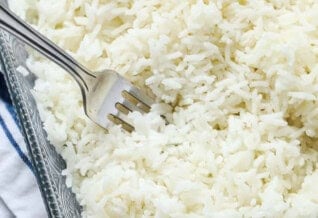 Baked Rice in the dish with a fork