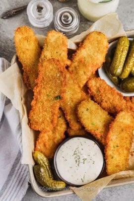 basket of Crispy Fried Pickles with pickles on the side