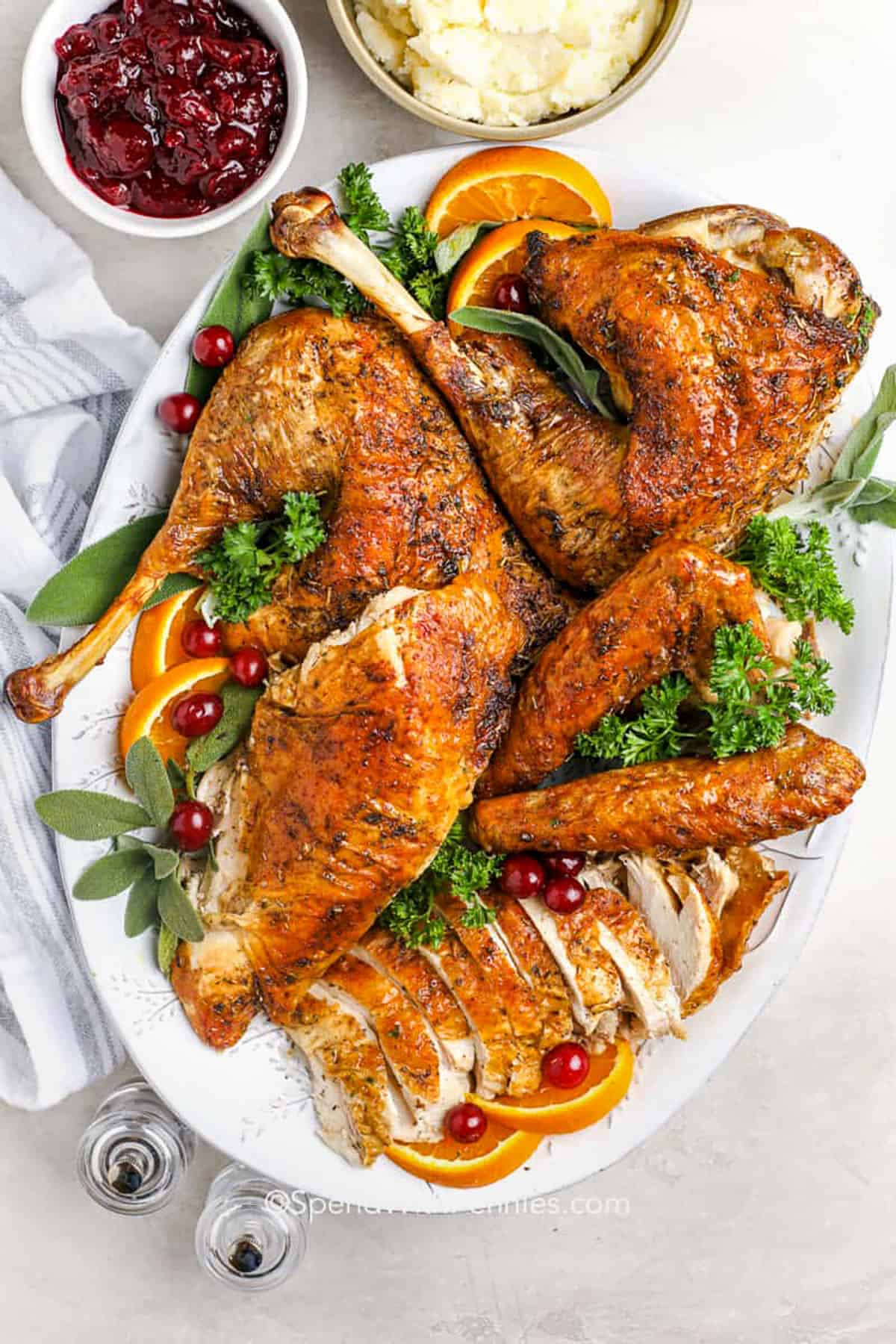 Spatchcock turkey is the key to juicy meat and crisp, golden skin, and it comes together without any guesswork. Flattening the bird helps it cook evenly so the flavor shines through. A simple mix of olive oil and herbs makes it tender and fragrant. Roast it in the oven or try it on the grill for a smoky twist. This recipe works great for turkeys around 12 pounds and turns out perfect every time. #spendwithpennies plated Spatchcock Turkey