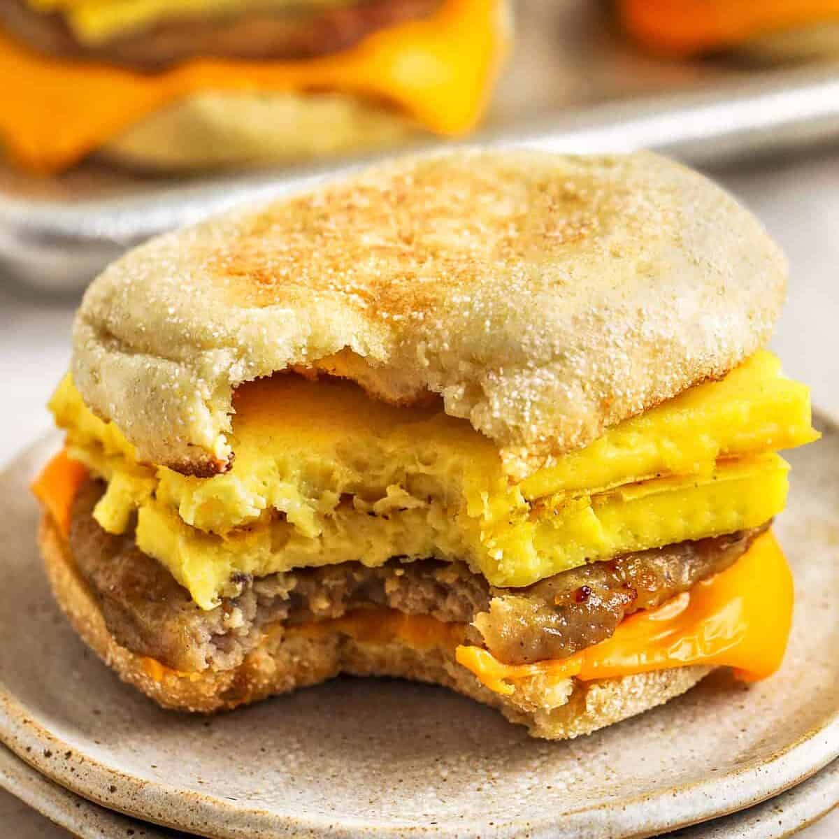Sausage and Egg Breakfast Sandwich with a bite taken out