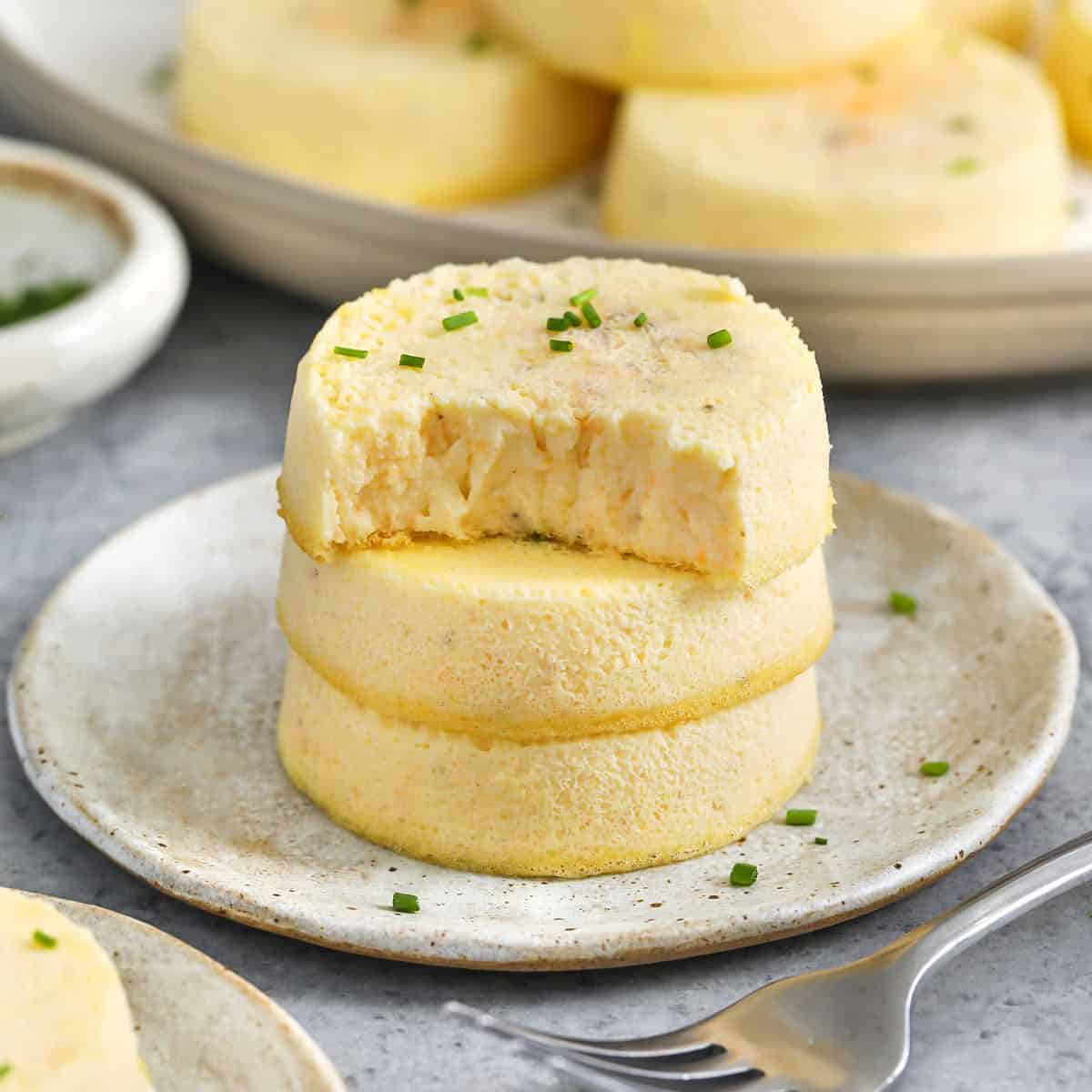 stack of Cottage Cheese Egg Bites with a bite taken out of one