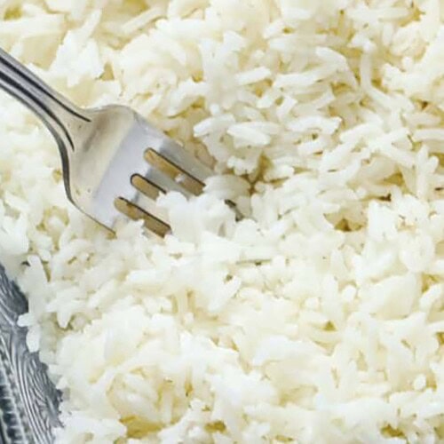 Oven Baked Rice being served with a fork