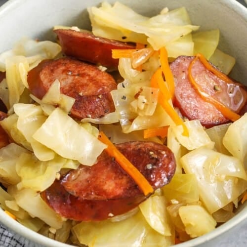 Cabbage and sausage prepared in a bowl