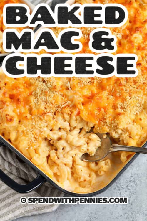 This baked mac and cheese recipe is the ultimate comfort food with its creamy, velvety sauce and golden bread crumb topping. Made from scratch with milk and cream, it’s a Southern favorite that feels homemade and cozy. Each bite is rich and cheesy with just the right amount of crunch. Add crispy bacon for the best easy twist on this classic casserole dish. It’s simple enough for weeknights but fancy enough for holidays with a side of green beans or salad for a complete meal. #spendwithpennies close up of Baked Mac and Cheese Recipe with a title