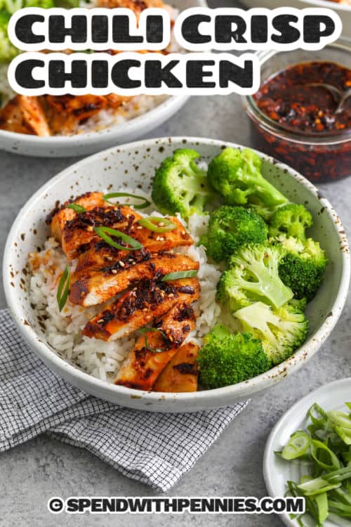 bowl of Chili Crisp Chicken on rice with broccoli and a title