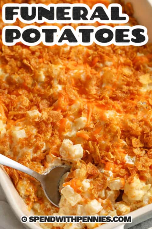 Cheesy funeral potatoes make the best comfort dish for contributing to a post-funeral buffet or any event. Frozen hash brown potatoes are cooked in a casserole with a creamy and cheesy sauce, under a crunchy cornflake topping. This dish is easy to make and serve from a crock pot. Swap diced potatoes for the hash browns if you prefer. Add this funeral potatoes recipe to your list of dependable, and always appreciated comfort dishes. #spendwithpennies Funeral Potatoes with a title