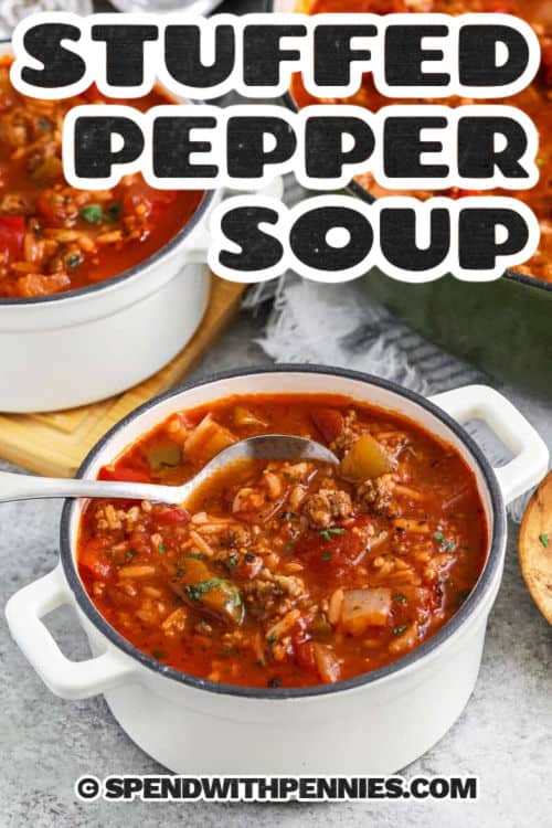 Stuffed pepper soup is a delicious twist on the classic dish, made into an easy-to-eat soup. This recipe uses ground beef, bell peppers, tomatoes, and rice to create a satisfying, well-rounded meal. It’s freezer-friendly, reheats well, and makes enough to feed the whole family. Add a sprinkle of cheese or a side of bread to complete this comforting dinner. #spendwithpennies stuffed pepper soup in a pot with a spoon and writing