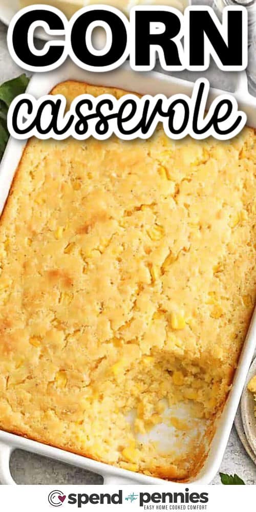baked corn casserole in a baking dish with writing