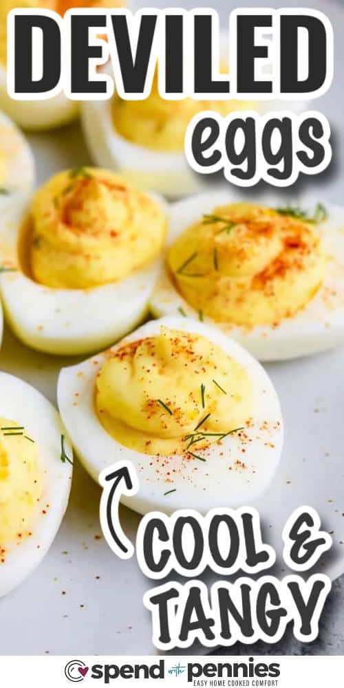 For a crowd-pleasing deviled eggs recipe, this easy version delivers every time. The filling is made with smooth yolks, mayonnaise, mustard, and vinegar, and finished with paprika or crumbled bacon. It is perfect for holidays, brunch, or casual get-togethers. You can also prepare it a day ahead to make hosting even easier. #spendwithpennies cool and tangy Deviled Eggs with writing