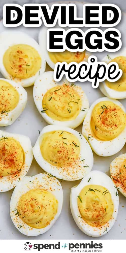 For a simple deviled eggs recipe that tastes like a favorite from a restaurant, this one is creamy and rich. Boiled eggs are filled with a mixture of mayonnaise, mustard, and vinegar, and you can garnish them with paprika or bacon for a delicious touch. Ideal for brunches or parties. You can also experiment with different toppings like chives or pickles for variety. #spendwithpennies Deviled Eggs recipe on a plate with a title