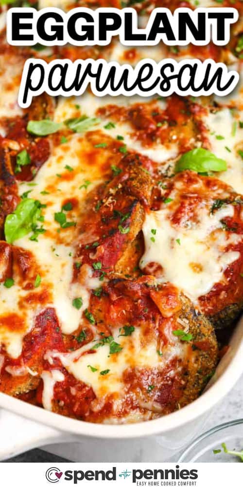 Eggplant parmesan is a cheesy baked recipe that’s rich, hearty, and loaded with flavor. Slices of eggplant are coated, cooked until golden, then layered with marinara, herbs, and plenty of cheese. This dish is the best comfort food, whether you’re looking for a meatless dinner or a new twist on Italian-style favorites. It’s easy enough for a weeknight yet special enough to serve guests. It’s a healthy swap for chicken parmesan that’s just as delicious. #spendwithpennies cheesy Eggplant Parmesan with a title