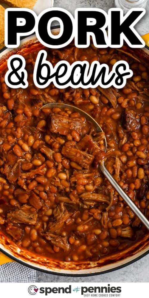 Pork and beans is a timeless recipe that blends tender seared pork, chopped onion, garlic, and a flavorful sauce with canned baked beans and white navy beans. The pork is cooked until fork-tender, then shredded into a dish that’s warm and comforting. Each spoonful is savory, sweet, and smoky. This hearty favorite is great for potlucks, camping, or family dinners with cornbread or coleslaw on the side. #spendwithpennies pot of Pork and Beans with a spoon and a title