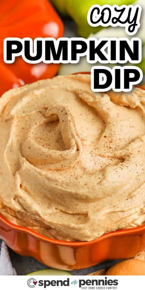 Pumpkin dip is a dessert that feels like pie, pudding, and cheesecake all at once. This easy recipe mixes smooth cream cheese, fluffy whip, pumpkin puree, and cozy spices for a sweet dip that is light yet rich. Perfect with fruit slices or crunchy cookies, it is a kid-friendly and party-perfect choice. With a creamy base and warm spice, this dip is sure to be a seasonal favorite that you will make again and again whenever fall flavors call. #spendwithpennies cozy Pumpkin Dip in a dish with a title