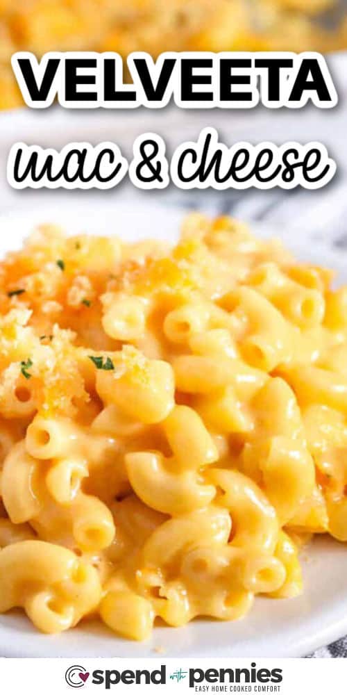 This baked Velveeta mac and cheese recipe brings rich, homemade flavor to your table in no time. The creamy sauce mixes Velveeta, cheddar, milk, and seasonings for that signature smoothness everyone loves. You can bake it with a buttery breadcrumb crust, or skip the oven and keep it warm in a Crock Pot for easy serving. It’s comfort food that outshines any box mix! #spendwithpennies Velveeta mac and cheese on a white plate with writing