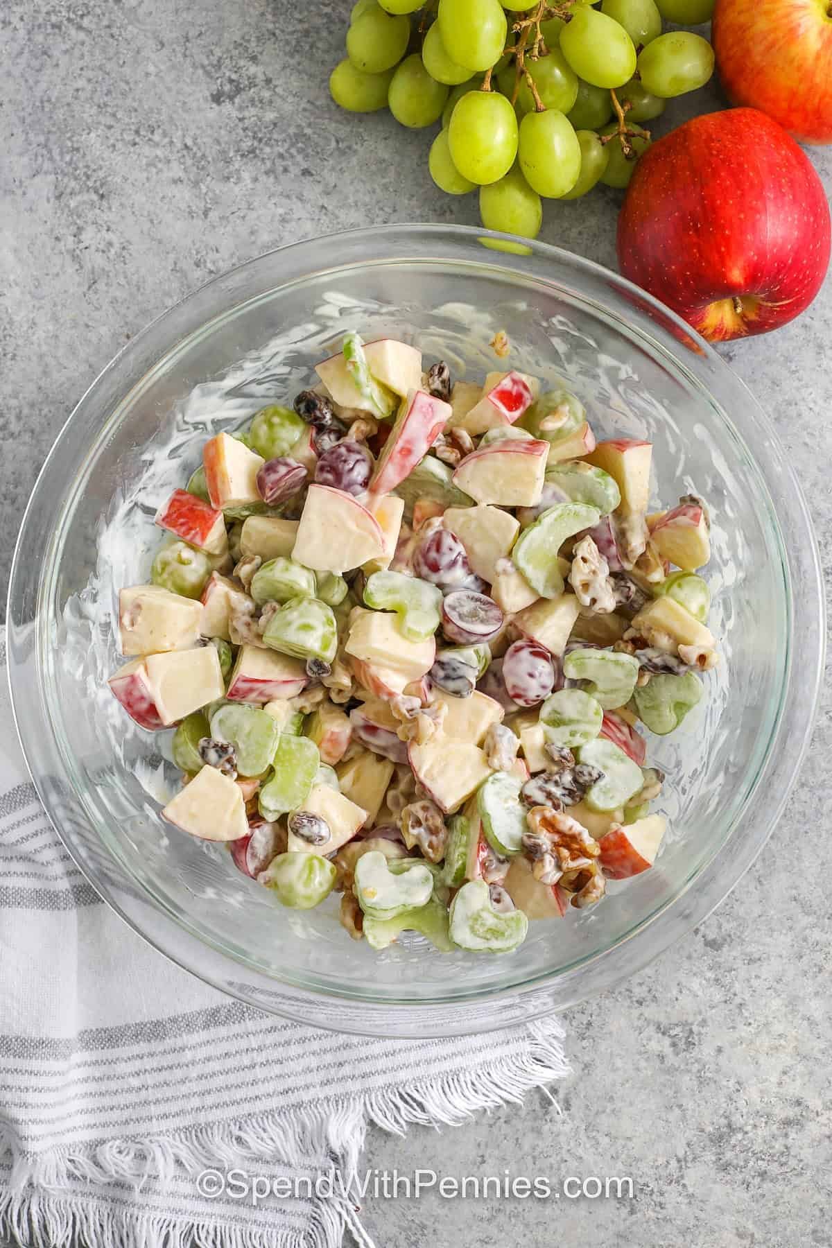 walforf salad in a glass bowl