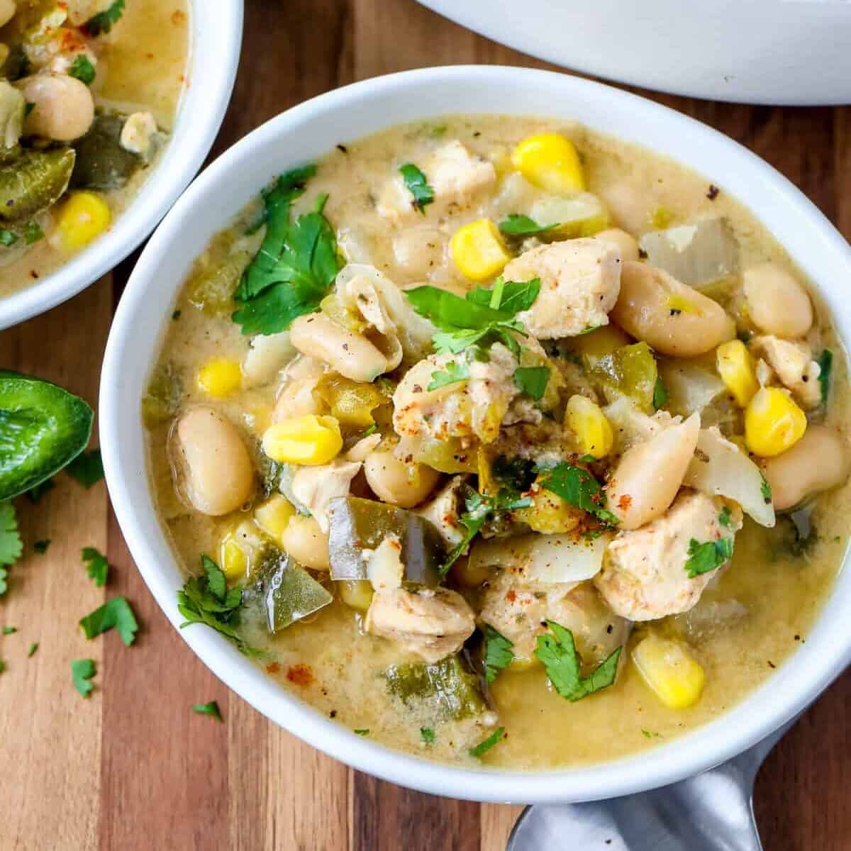 top view of white chicken chili in bowls