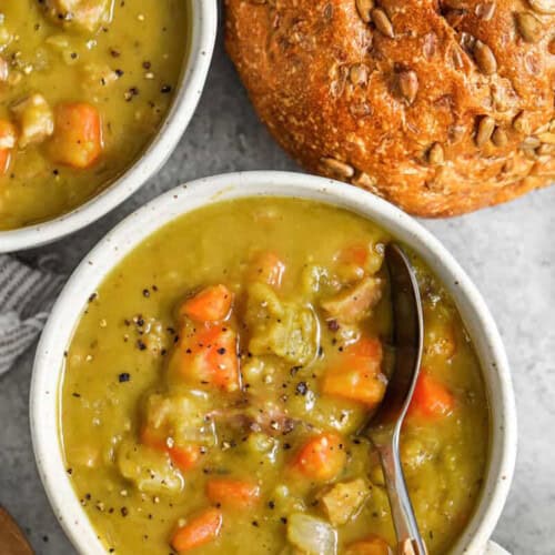 Split Pea Soup in bowls with a spoon