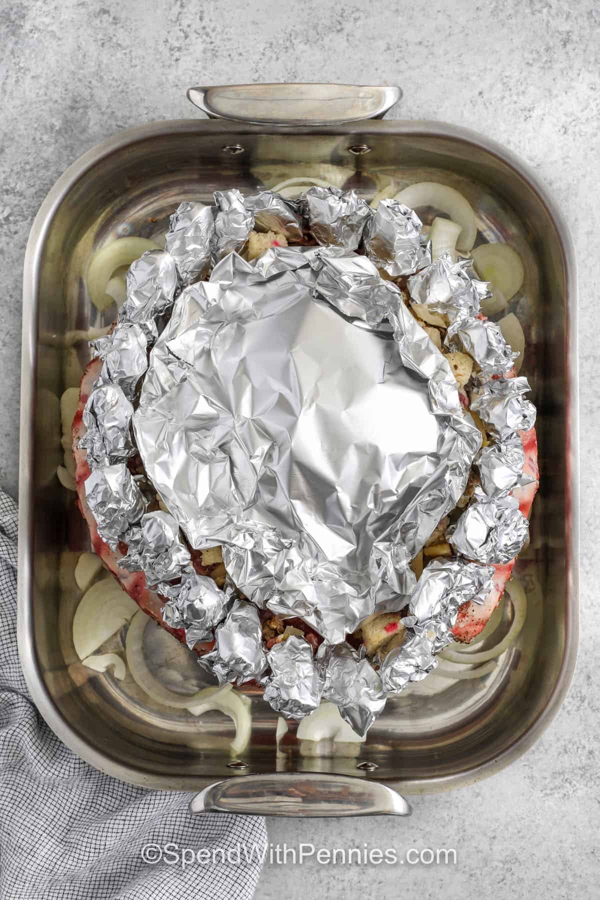 top view of adding tin foil to Pork Crown Roast