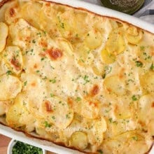 A casserole dish filled with with a scalloped potato recipe