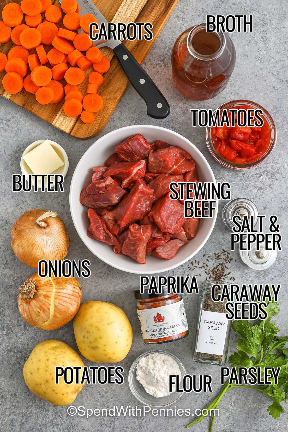 Hungarian goulash brings together tender beef, onions, and a flavorful paprika broth for a meal that’s hearty and comforting. This simple recipe can be cooked on the stovetop or baked slowly in the oven for rich flavor that deepens as it cooks. Add potatoes and carrots for a filling one-pot dinner everyone will love. #spendwithpennies butter carrots , broth , tomatoes , stewing beef , salt and pepper , onions , potatoes , paprika , caraway seeds , flour , parsley with labels to make Hungarian Goulash