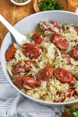 cooked Kielbasa and Sauerkraut in a pan