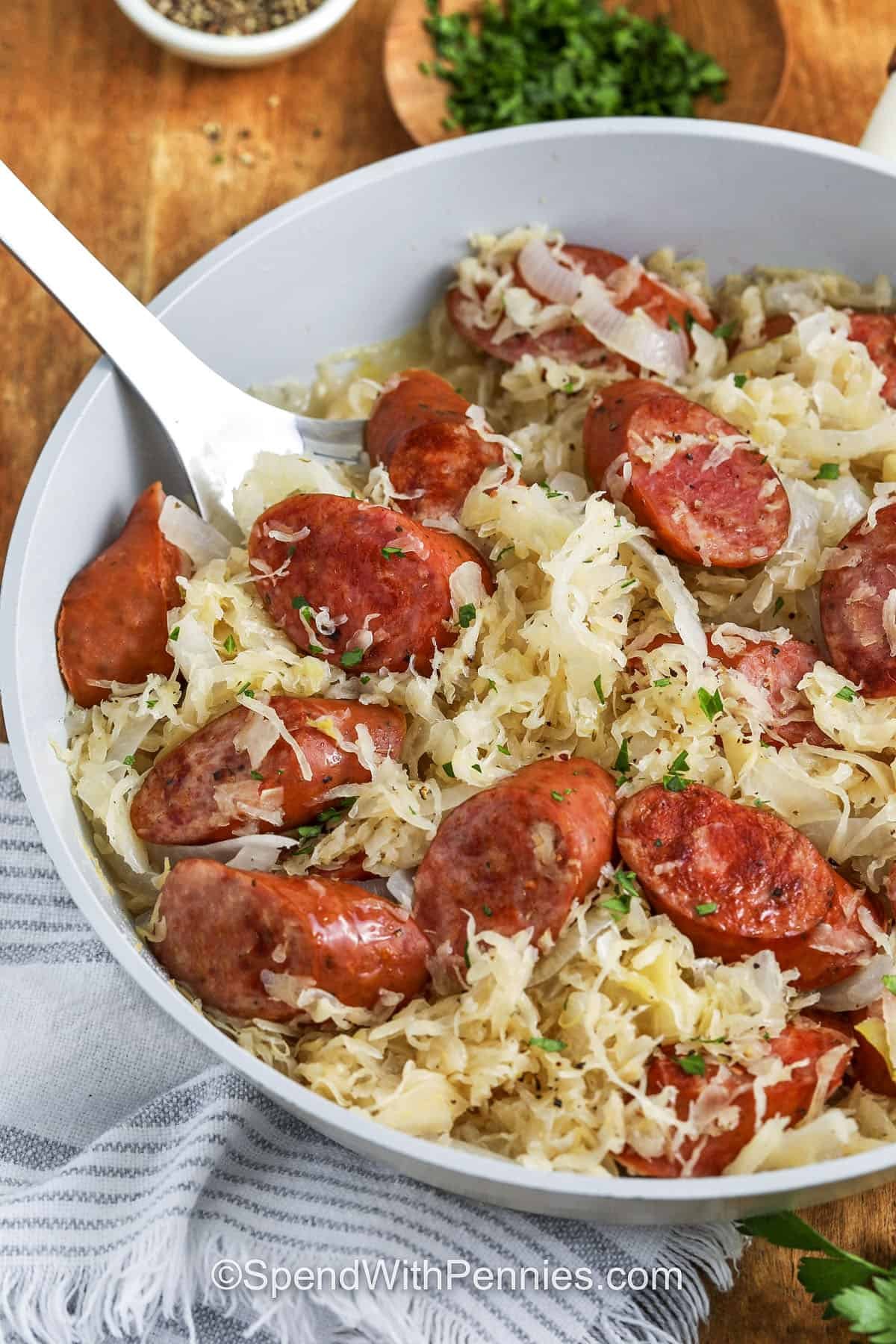 cooked Kielbasa and Sauerkraut in a pan