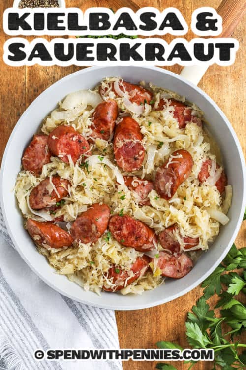Kielbasa and Sauerkraut in a pan with a title