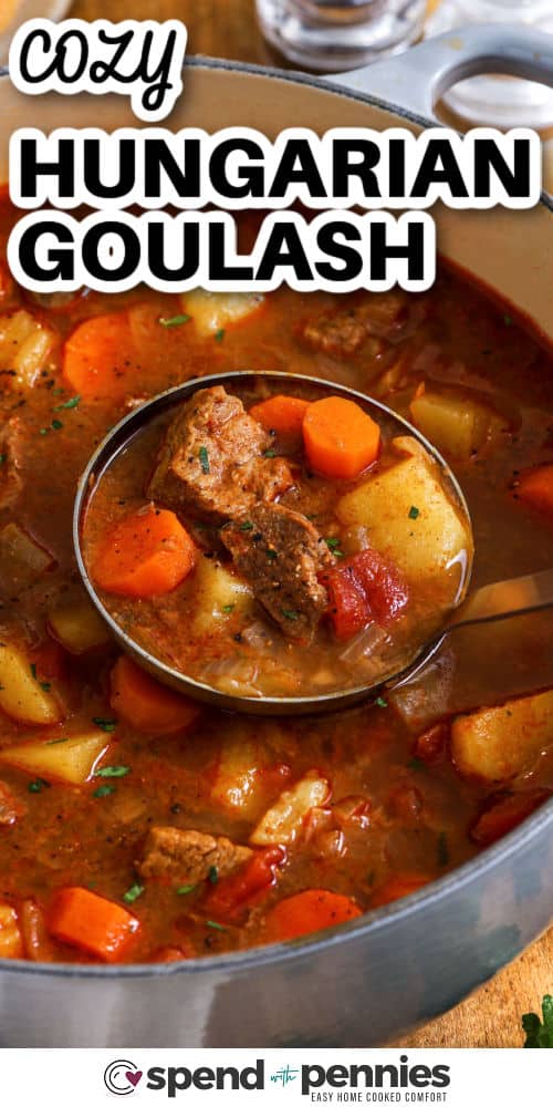 Hungarian goulash is the best beef stew to cozy up with on a cool night. Tender beef, onions, and paprika come together in a rich tomato-based broth for bold, comforting flavor. Add carrots and potatoes to make it even heartier, and finish with a dollop of sour cream. Whether made on the stovetop or slow cooked in the oven, it’s always satisfying. #spendwithpennies Hungarian Goulash in a Dutch oven with a ladle and a title