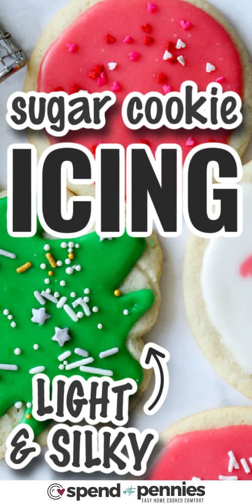 This sugar cookie icing makes cookies bright and glossy with smooth color that sets nicely. It mixes easily and has a mild vanilla taste that works well for holiday baking. You can use it on gingerbread, shortbread, or simple cutout cookies for a sweet touch that feels festive. It is a yearly favorite that helps make treats look extra pretty on any cookie tray #spendwithpennies closeup of sugar cookie icing in red and green on Christmas cookie cutouts, with writing