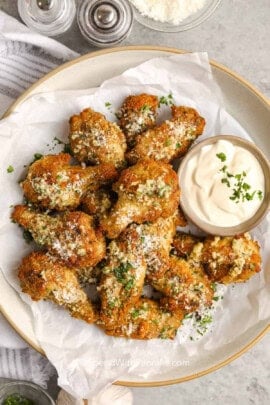 plated Garlic Parmesan Wings with dip