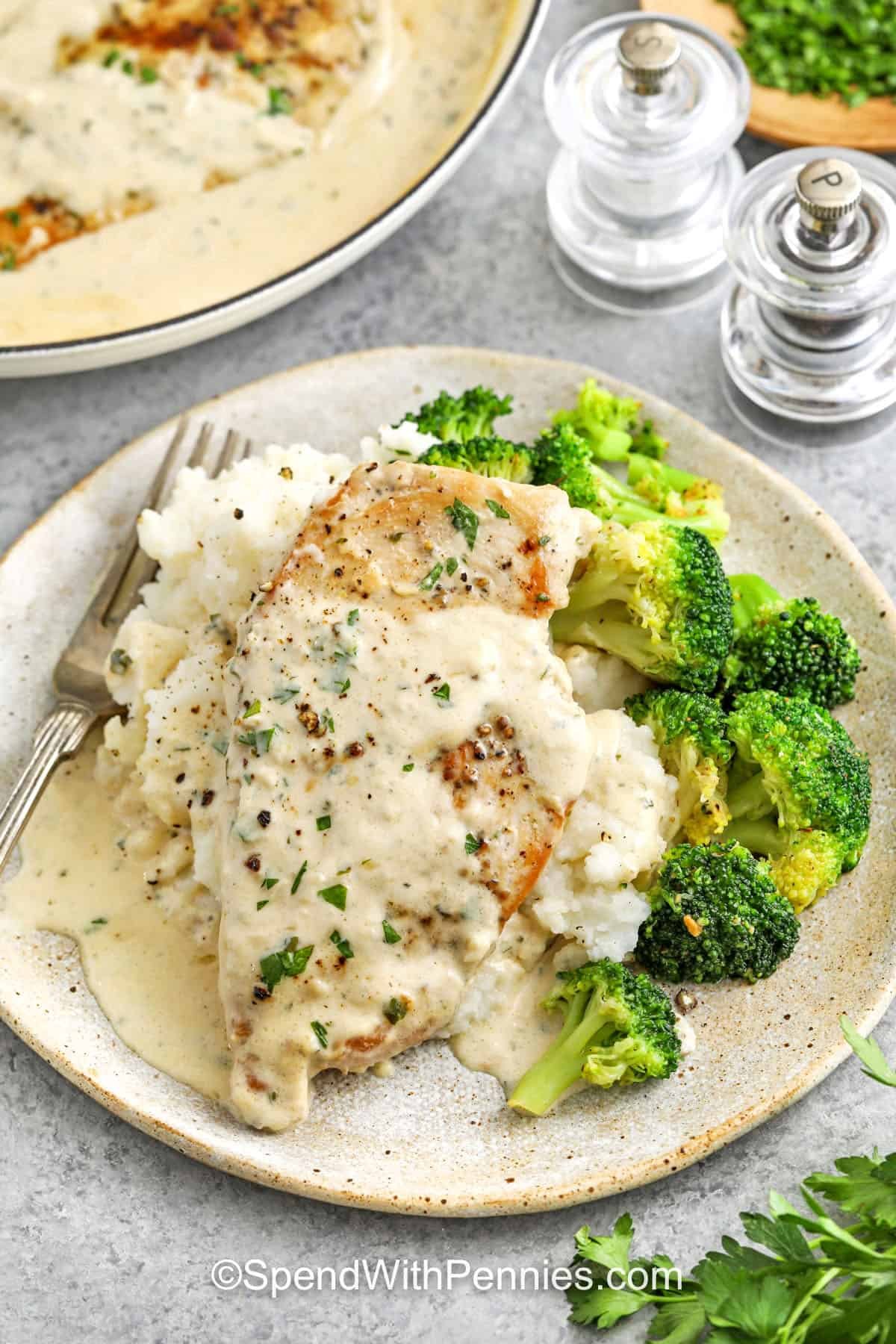 plated Boursin Chicken with pan full in background