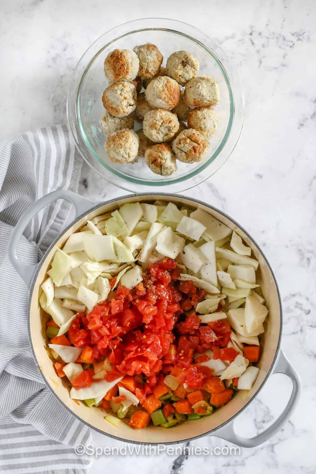 veggies in pot with a bowl of meatballs to make Cabbage Meatball Soup