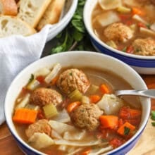bowls of Cabbage Meatball Soup with bread