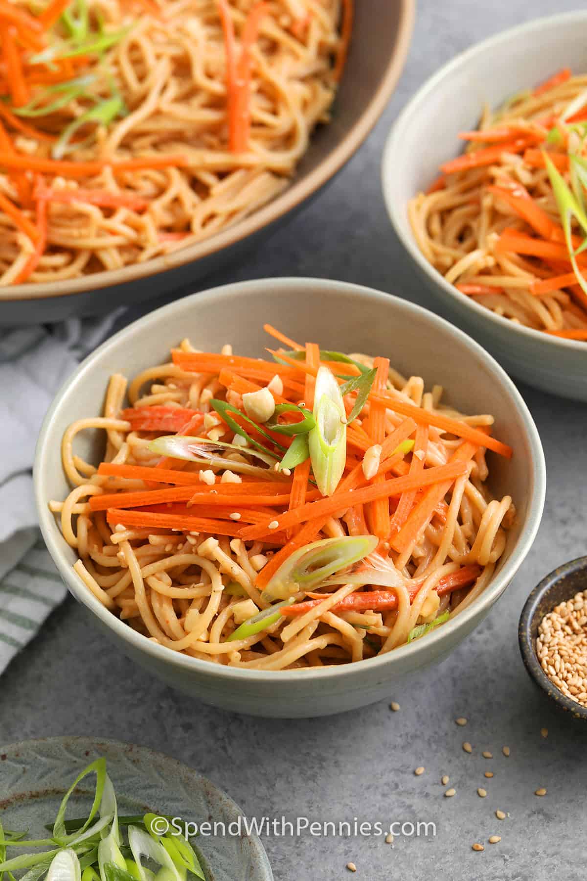 cold sesame noodle salad in white bowl