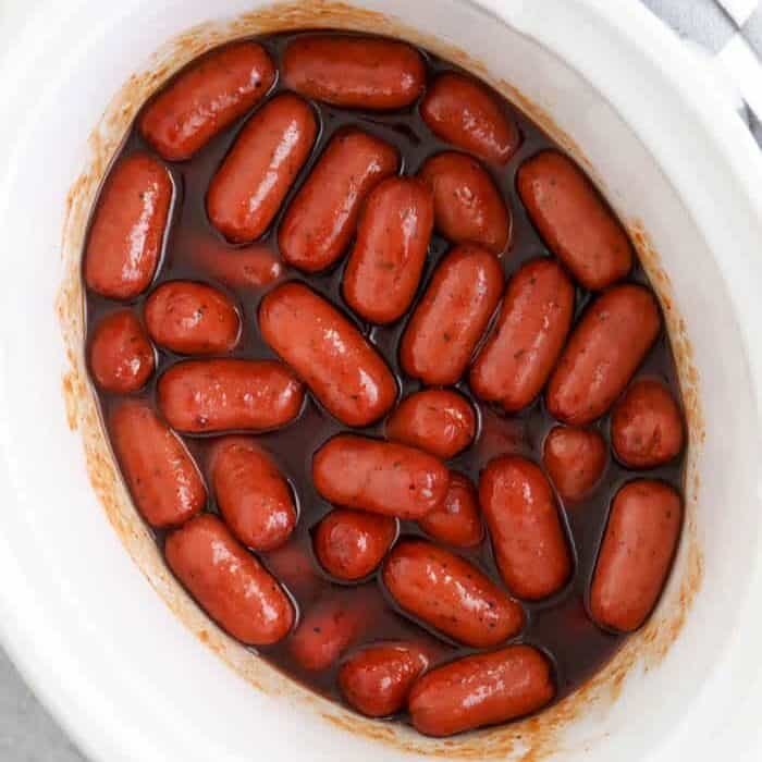 Crock-Pot little smokies in a white crock pot
