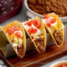 Three hard shell tacos topped with Crockpot Taco Meat and classic taco toppings.