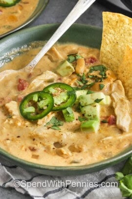 close up of creamy Crockpot White Chicken Chili in a bowl