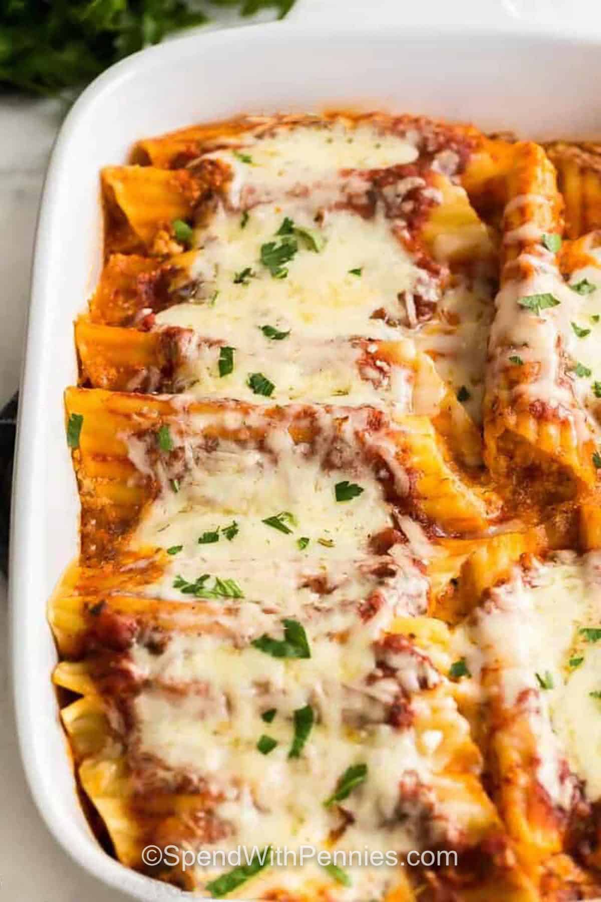 cheesy Easy Stuffed Manicotti in a casserole dish