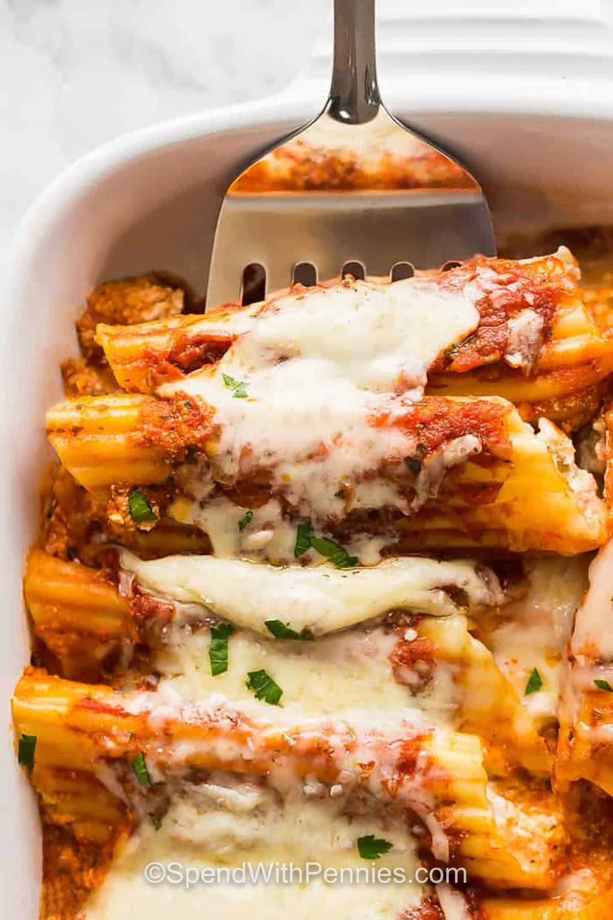 close up of savory Easy Stuffed Manicotti in the dish