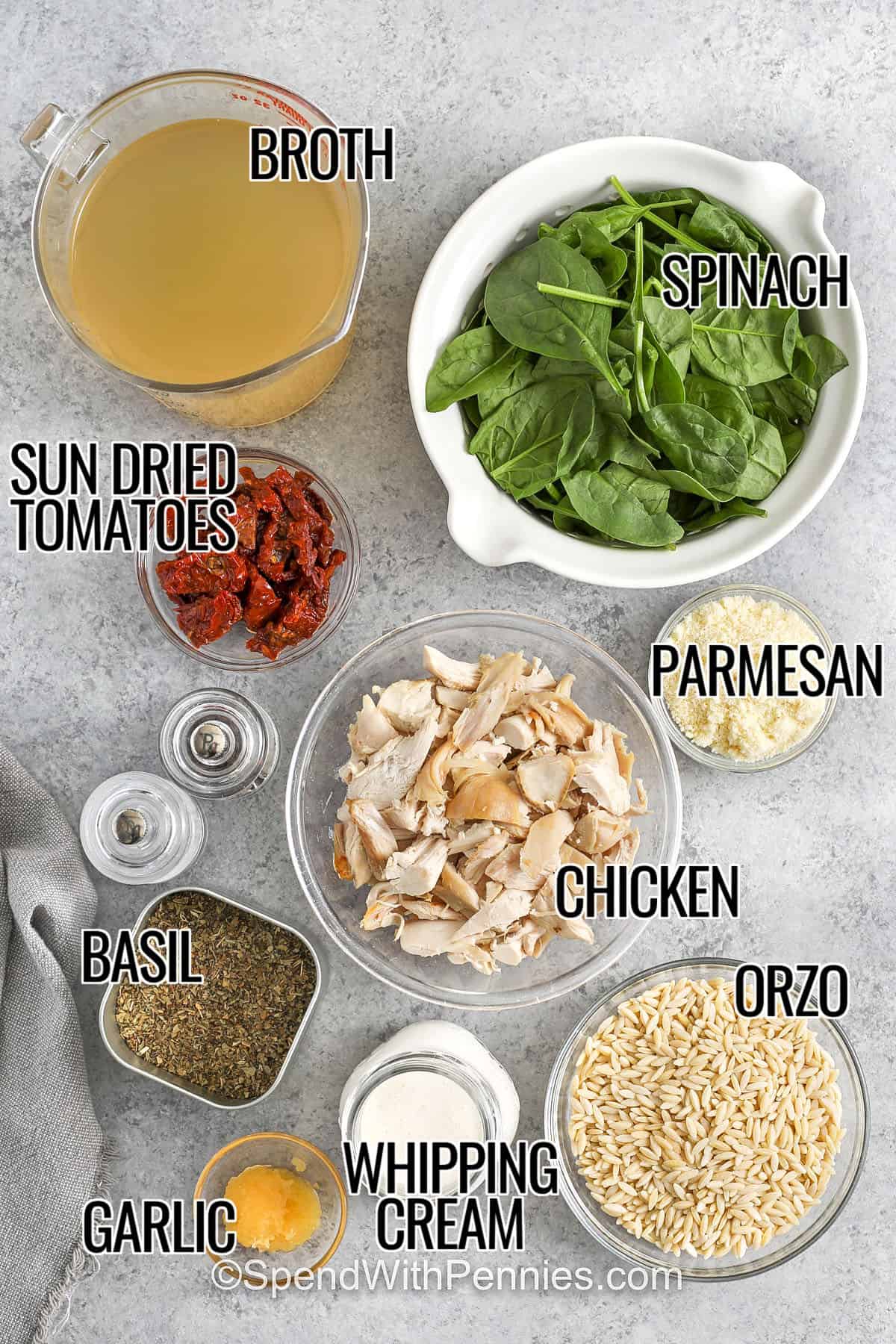 broth , spinach , sun dried tomatoes , parmesan , basil , garlic , whipping cream , chicken and orzo to make Marry Me Chicken Orzo